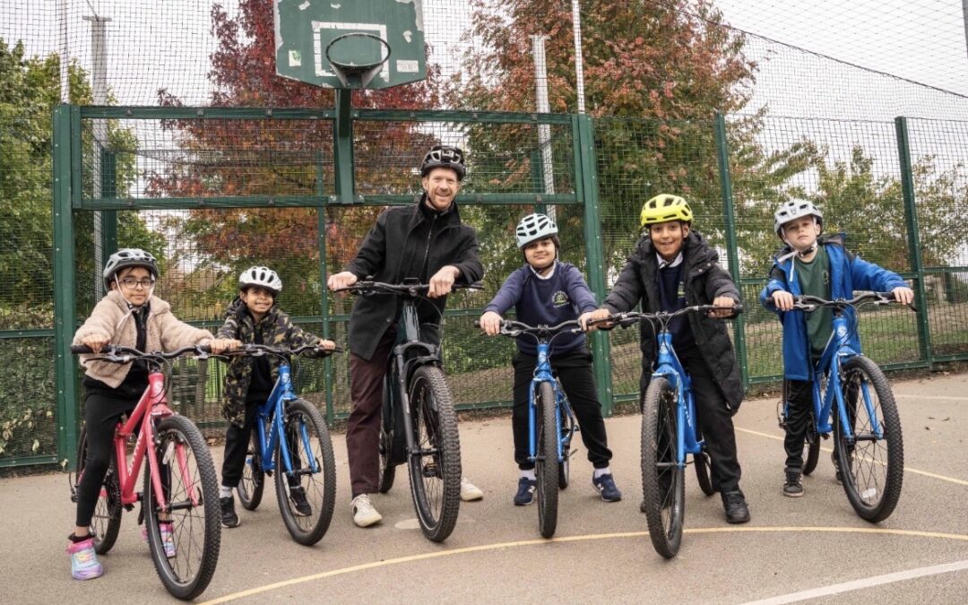 Sheffield pupils cycle with Olympic champion Ed Clancy after winning Walk and Wheel Challenge