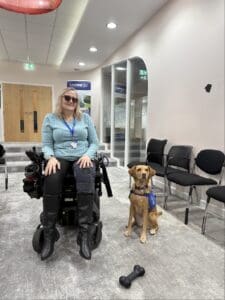 Wendy Martin with her disability assistance dog, Penny
