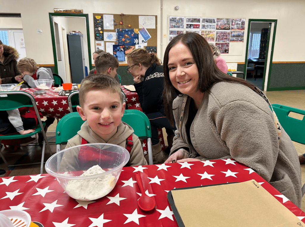 Woman and her son smiling for picture