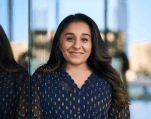 Shani Dhanda posing next to a window