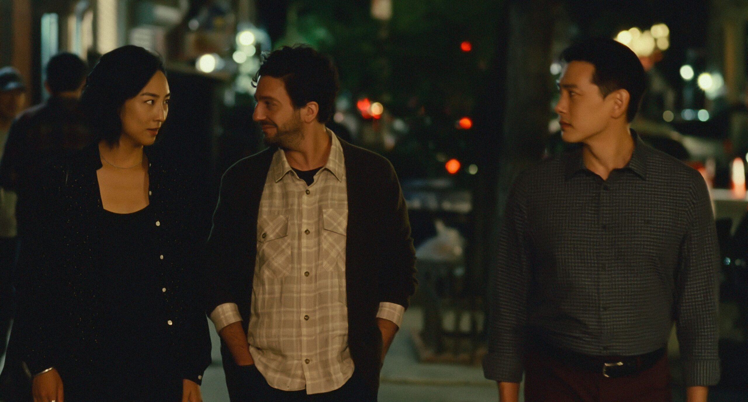 Image from Past Lives with Greta Lee, John Mararo and Teo Yoo who all share subtle relationships