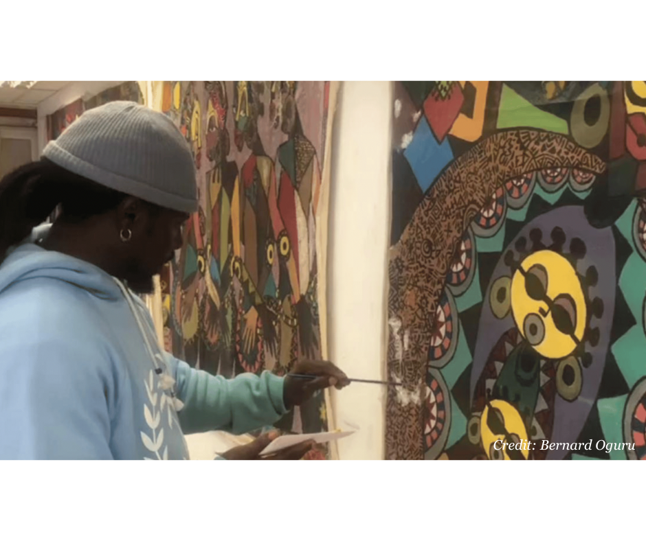 Picture of Artist Bernard Oguru painting