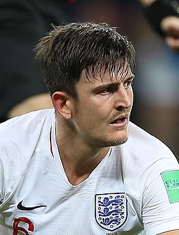 Harry Maguire wearing the number 6 England shirt
